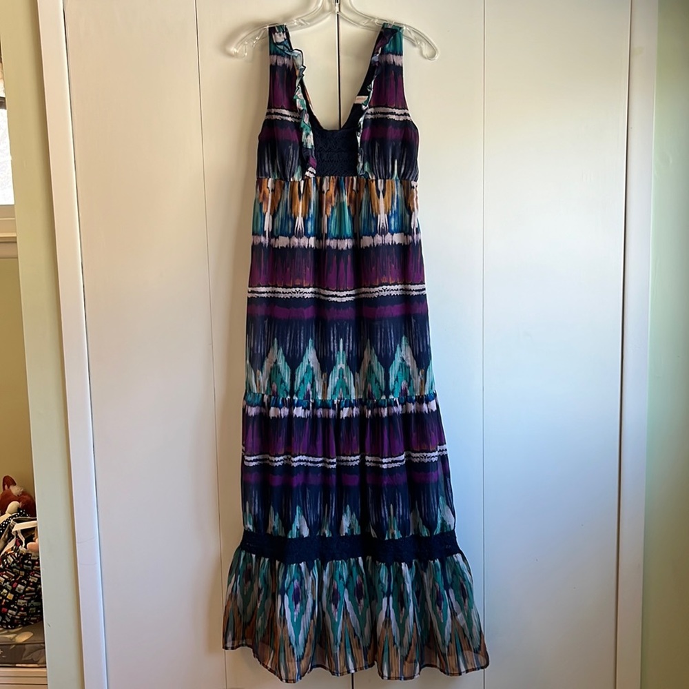 Juniors maxi dress with ruffles, crocheted details. Fully lined.